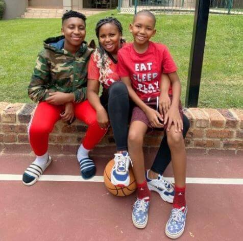 Carol Tshabalala with her two children.